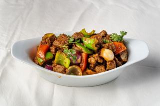 Sauté d'agneau aux épices : recette mijotée aux saveurs du monde